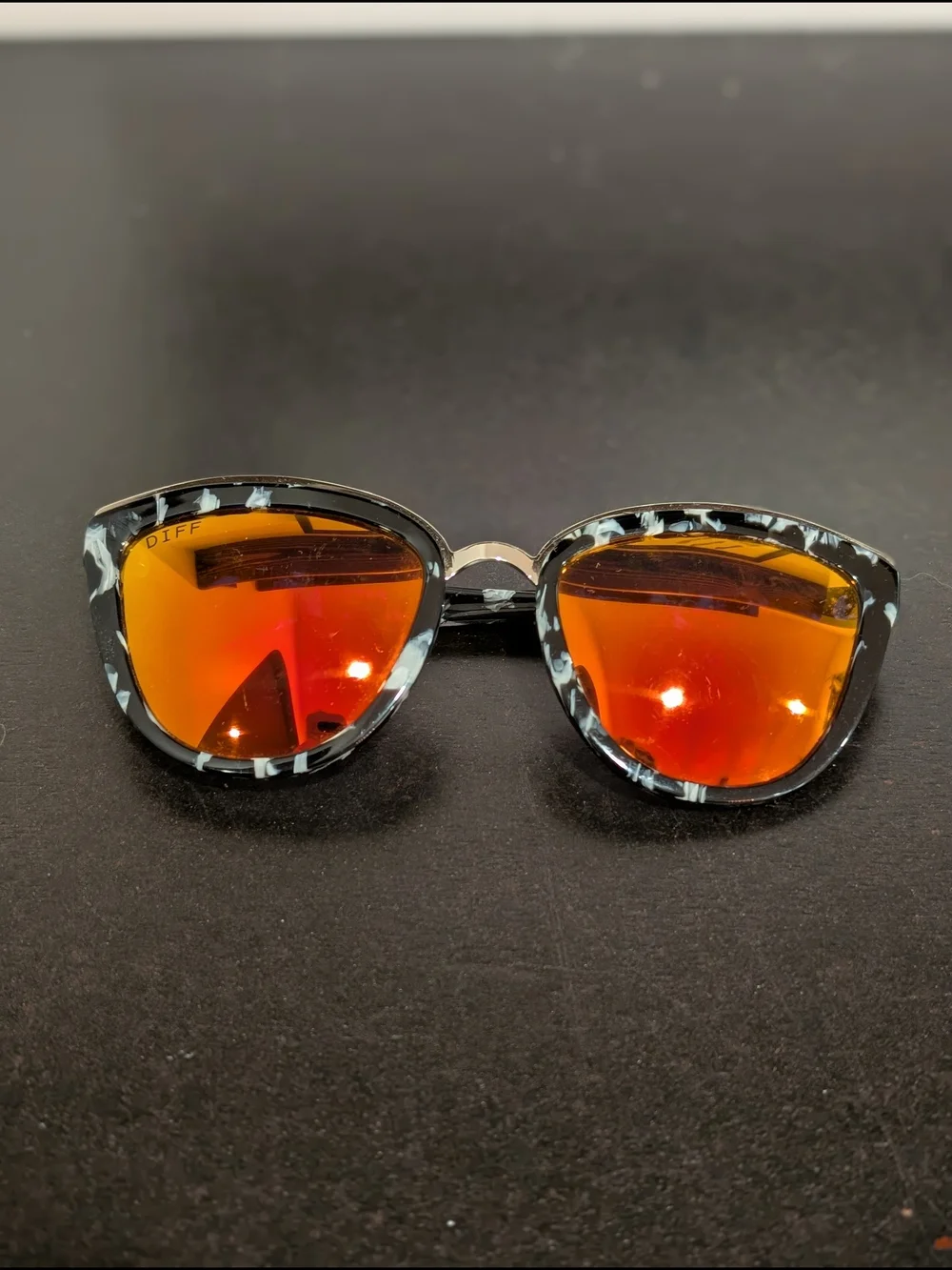 DIFF Cat-Eye Sunglasses in Black Marble with Red Mirror Lenses